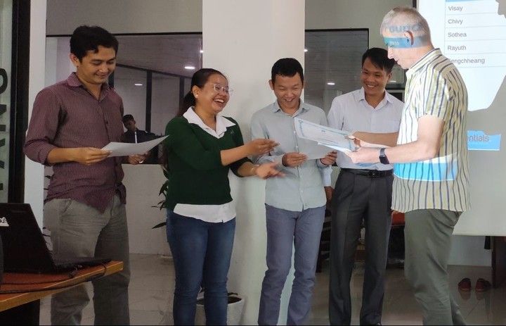 Web Essentials employees receiving shares certificates