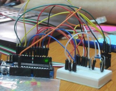 Prototype of an electronic device with lots of colorful wires.